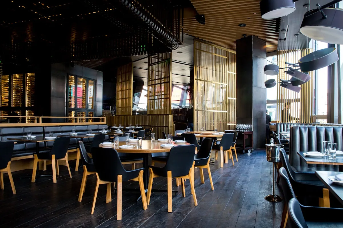 Stylish London restaurant interior with ambient lighting and a busy evening service.